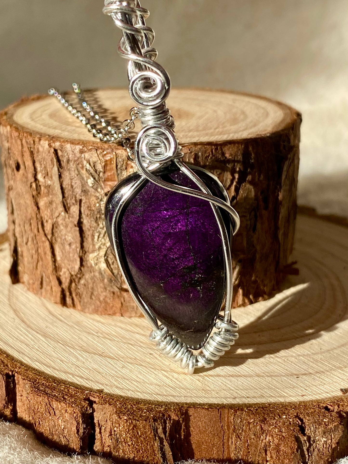 Wire wrapped flashy Purpurite pendant