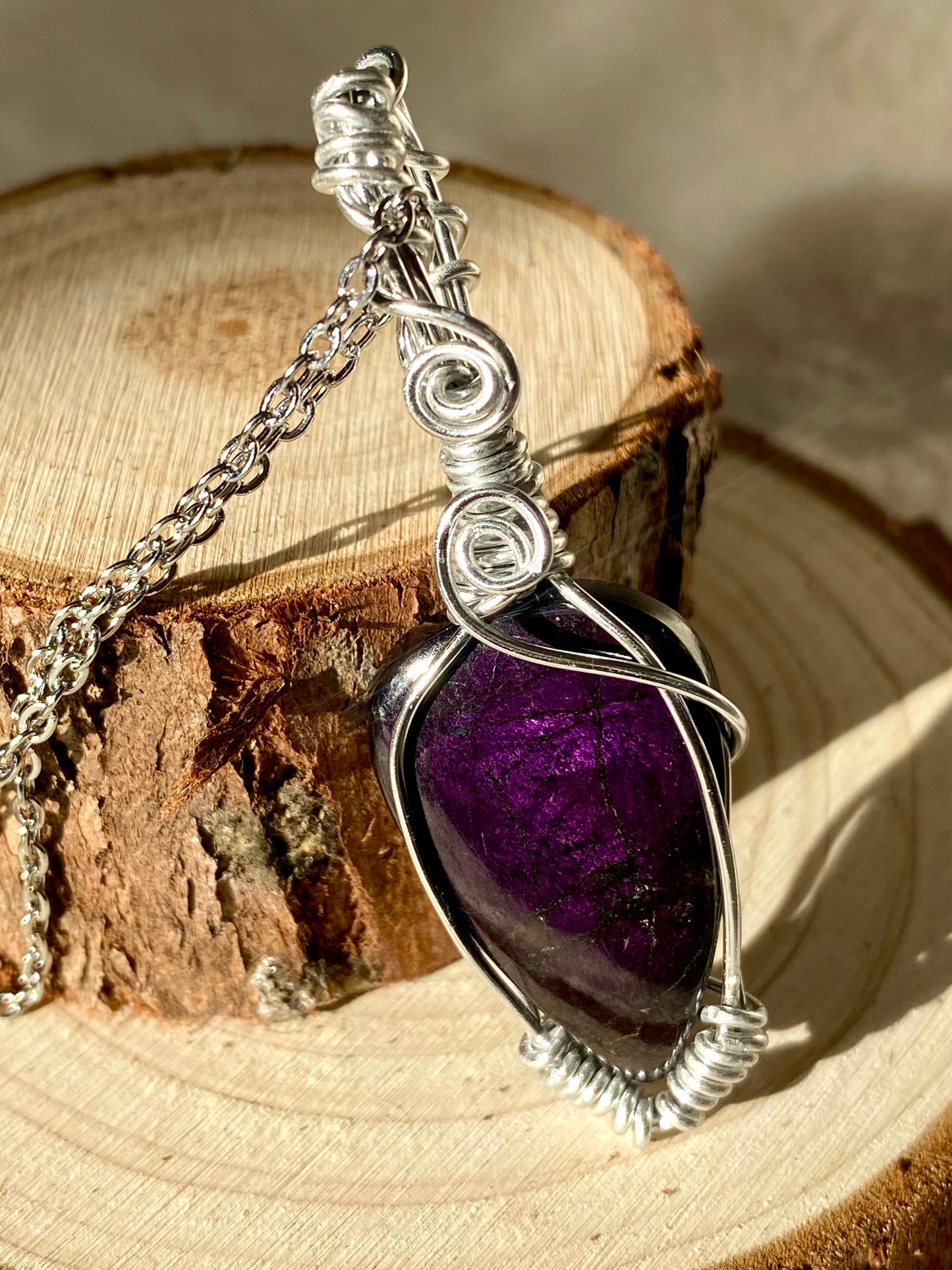 Wire wrapped flashy Purpurite pendant