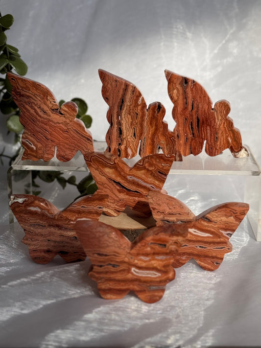 Indonesian Pink Crazy Lace Agate fairies and butterflies carvings