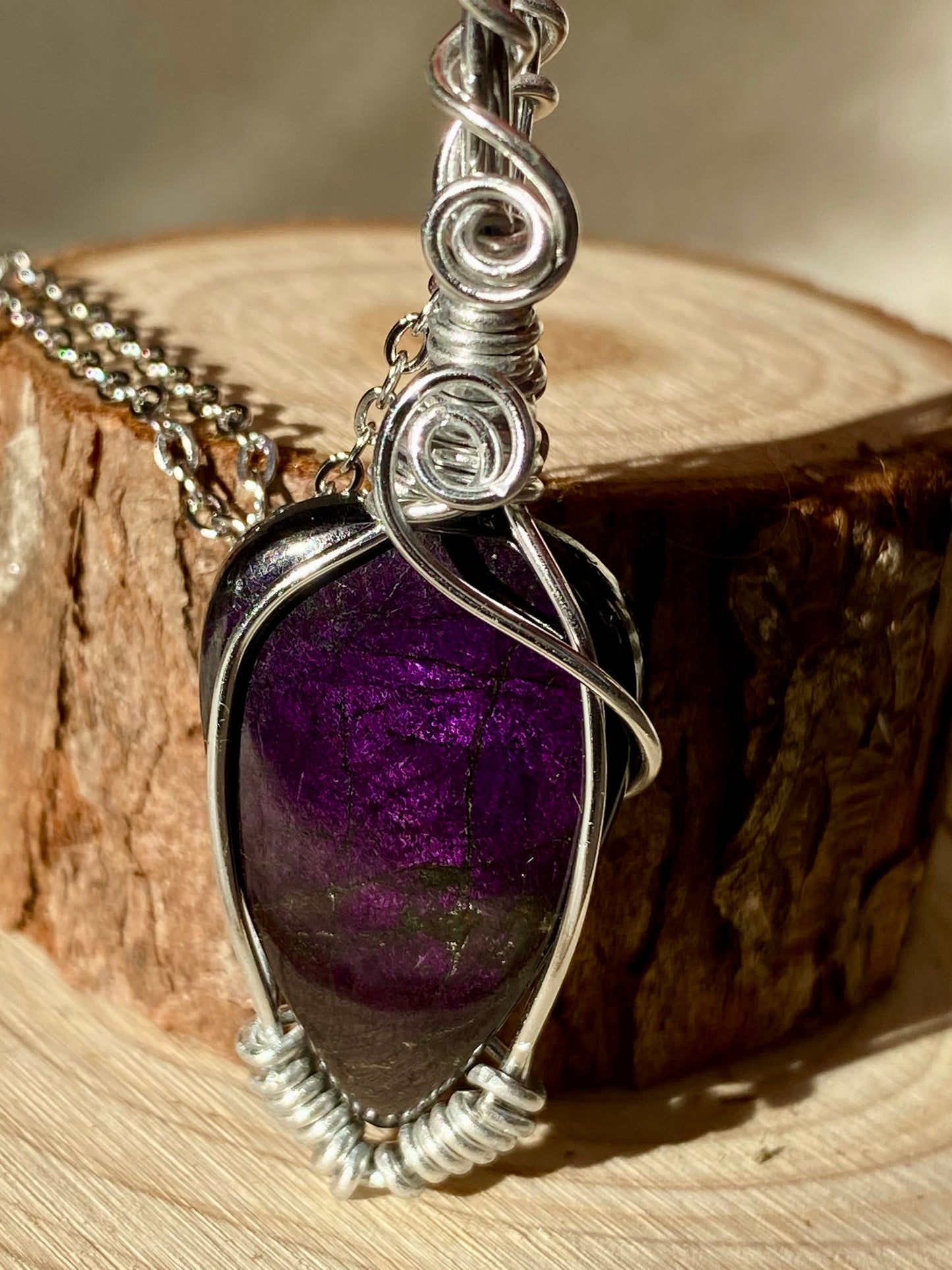 Wire wrapped flashy Purpurite pendant