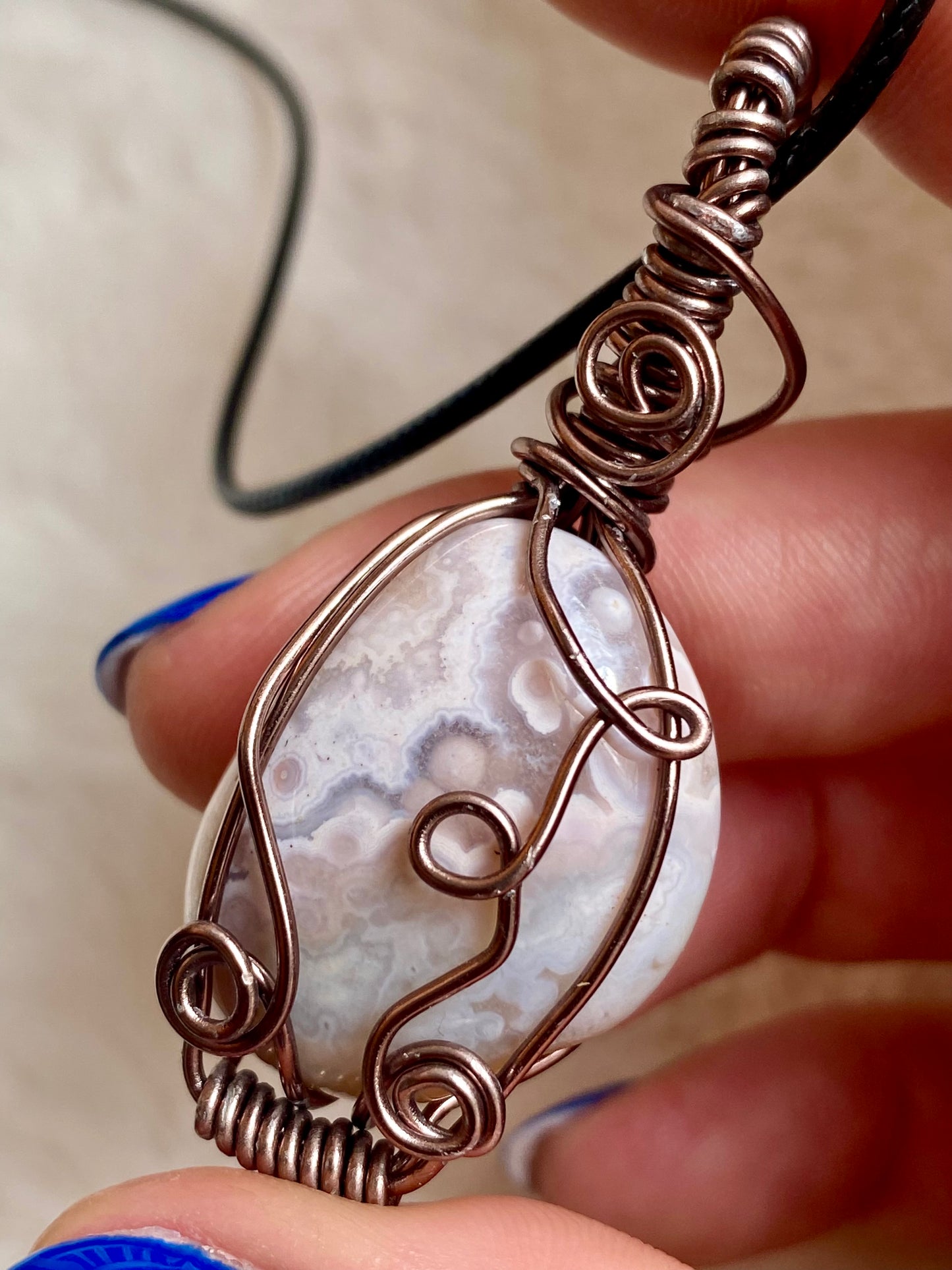 Wire wrapped Pink Amethyst and Flower Agate pendants